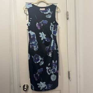 Floral figure fitting wrap style midi dress/ black and purple